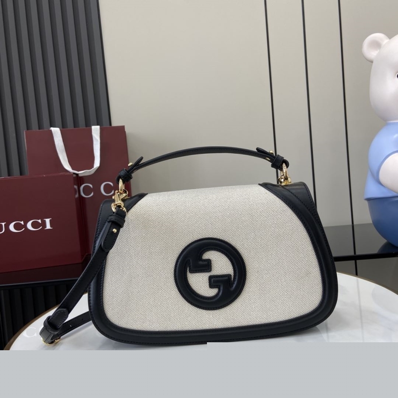 G*u*i top handle bags